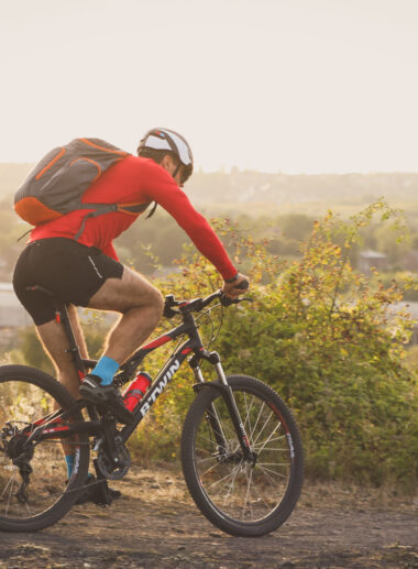 Man biking on slag heaps